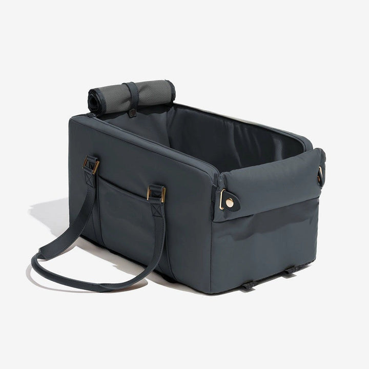 Small dog or cat carrier car seat, faux leather, designed for center console travel accessory.