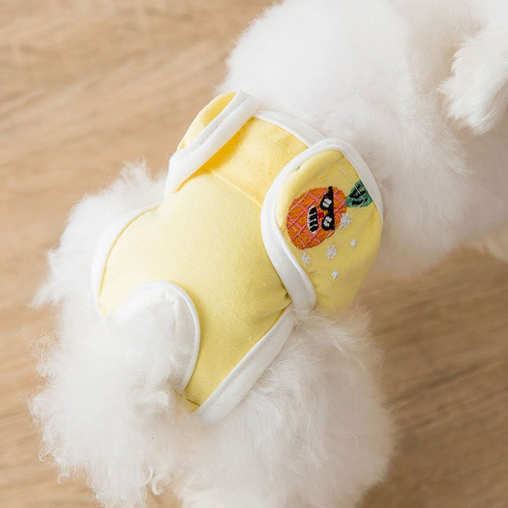 Close-up of soft, reusable female dog diaper, showing adjustable fasteners for a snug fit.