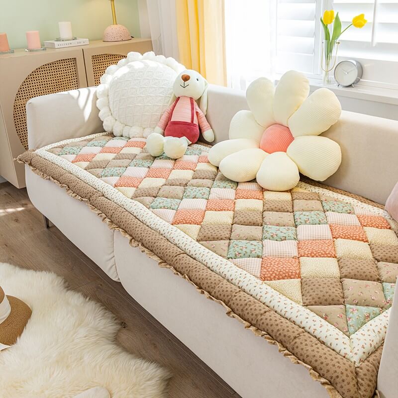 Non-slip feature of a floral pure cotton couch cover, ensuring it stays in place with pets.