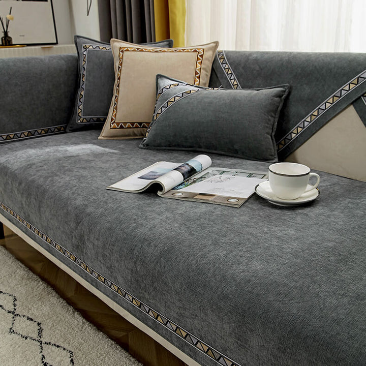 Brown geometric chenille sofa protector, non-slip backing, transforms living room furniture
