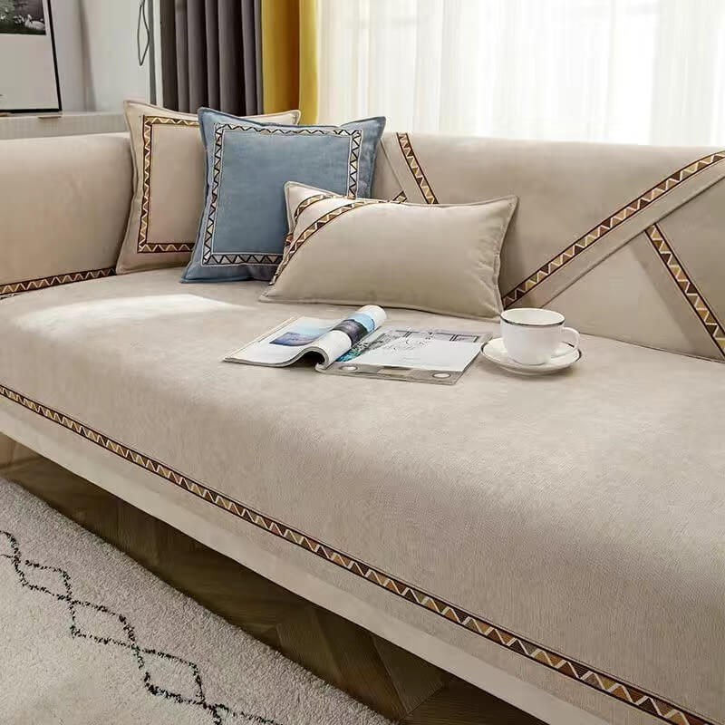 Stylish geometric chenille sofa cover with a textured surface, designed for pet owners, home decor
