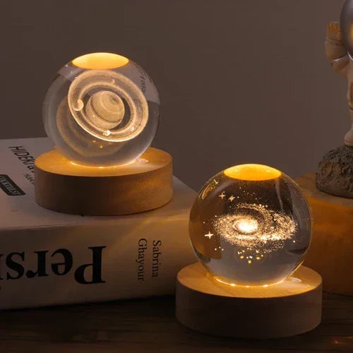 Elegant desk lamp: Glowing celestial sphere with detailed 3D engraved universe design for any room.