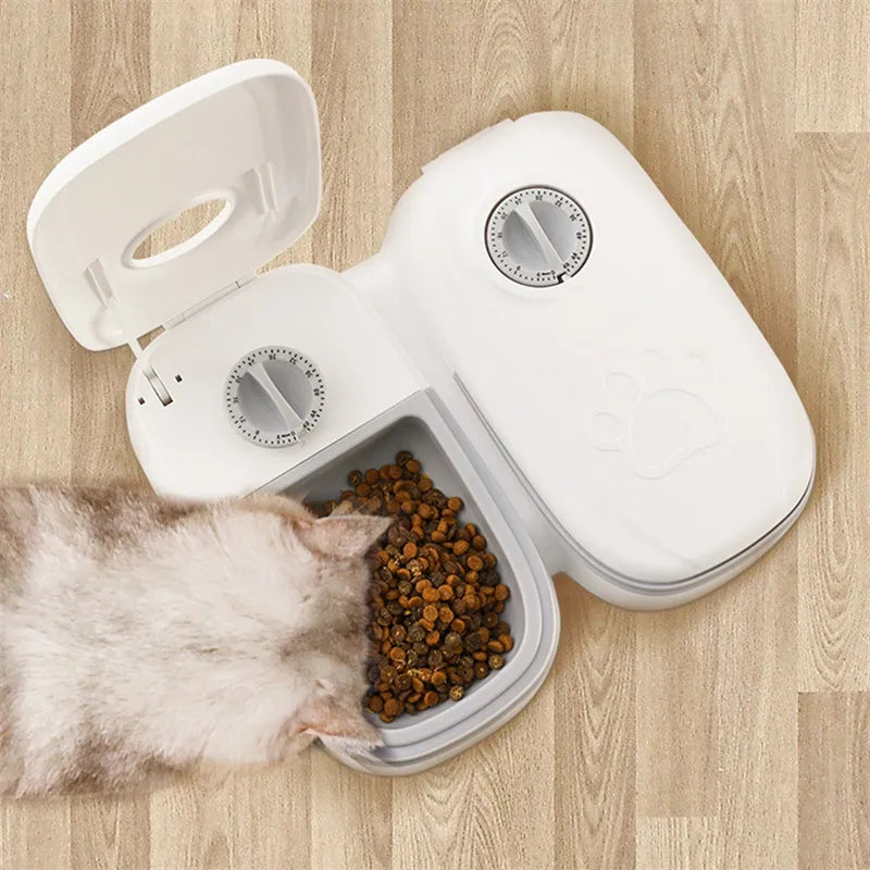 Gray automatic pet feeder with timer for cats and dogs, ensuring scheduled meal times.