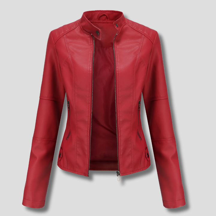 Wearing a women's red fitted moto jacket, slim-fit with stand collar. Trendy zip jacket for versatile street style.