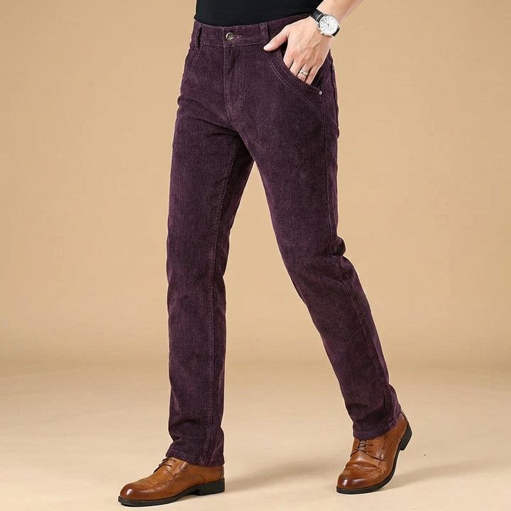 Tailored fit men's corduroy dress pants, perfect for sleek business casual or formal fashion.