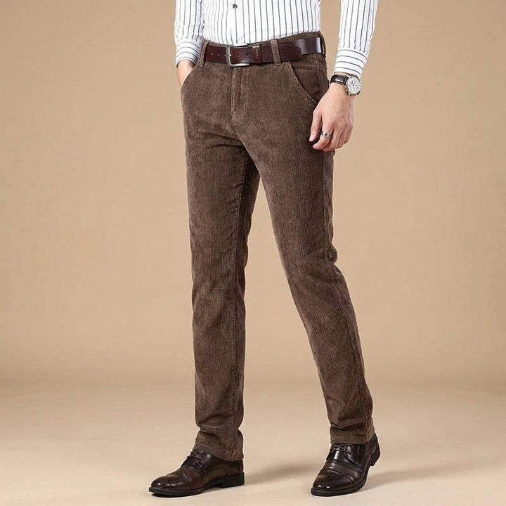 Close-up of premium corduroy men's dress trousers, highlighting sophisticated texture and comfort.