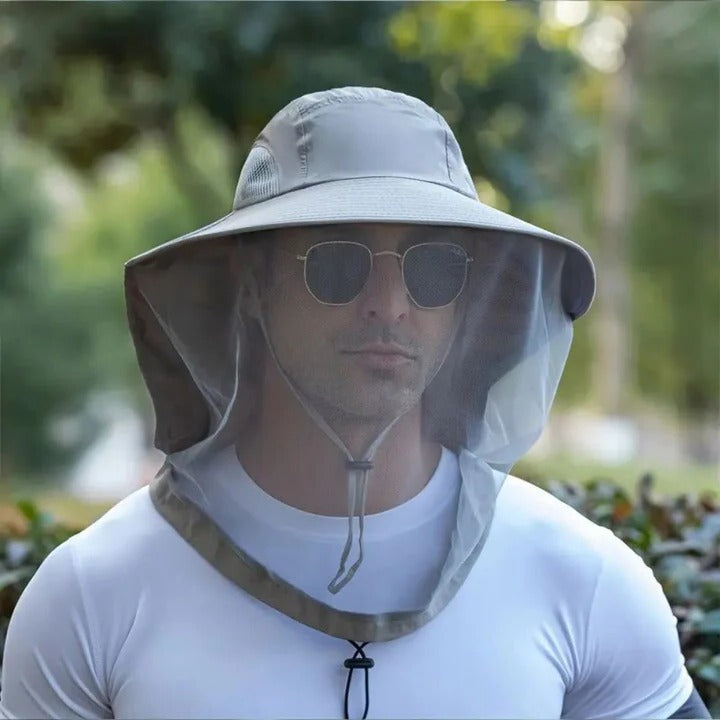 Foldable, breathable safari hat with wide brim & neck flap. Quick-dry, sun protection, insect repellent for adventurers.