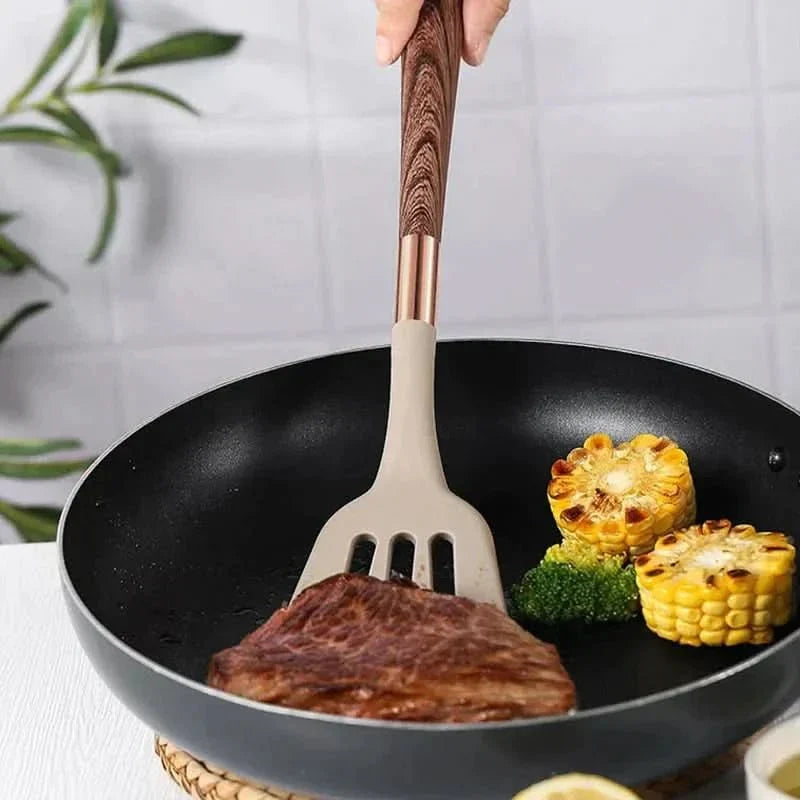 Heat-resistant silicone utensils for effortless cooking & baking. Premium chef tools with comfortable wooden handles.