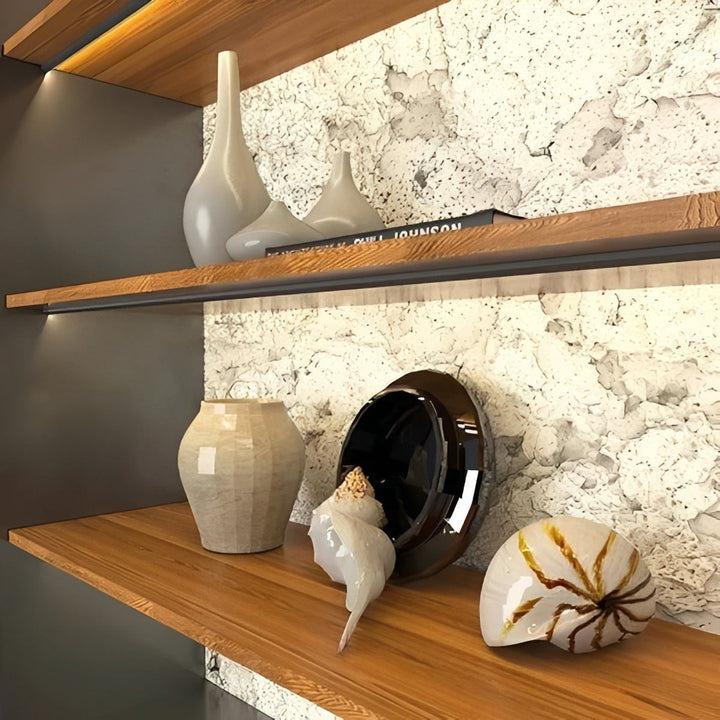 Bright LED under cabinet light strip, providing 45-degree angled task lighting for kitchens & workshops.