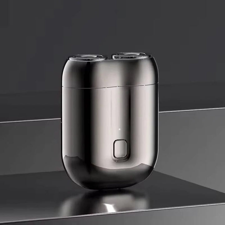 Rechargeable men's portable electric shaver with steel blades, ideal for travel & wet/dry grooming.
