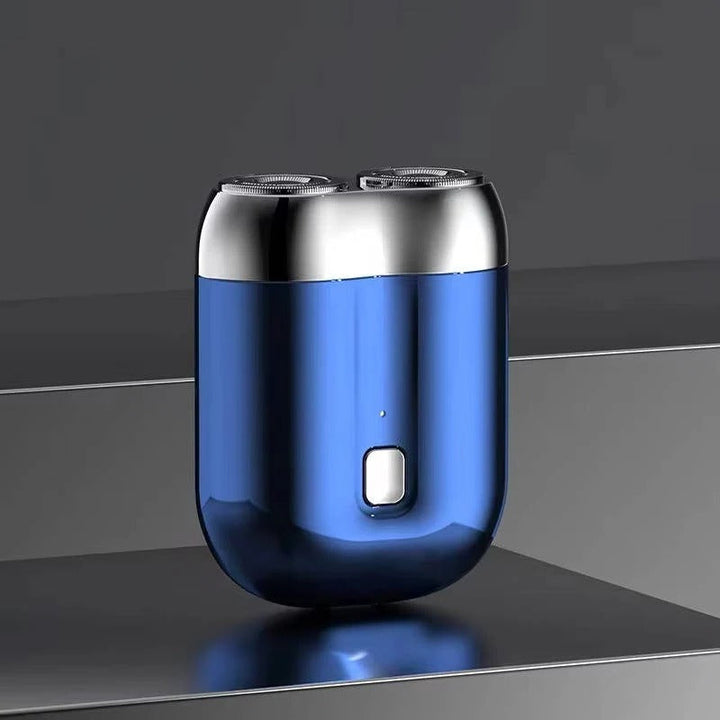 Close-up of magnetic head on men's waterproof electric razor for quick facial & body hair grooming.