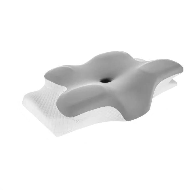 Memory foam neck pillow, contoured for spine alignment, with a breathable cooling cover for restful sleep.