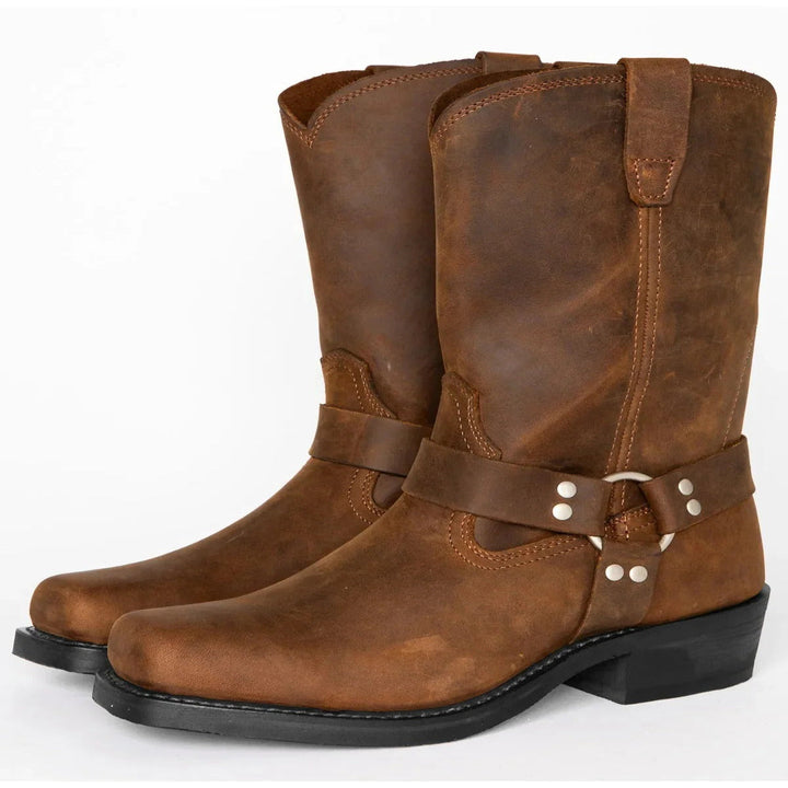 Rugged brown men's harness boots with an 11-inch shaft & non-slip sole, perfect for work or biker adventures.