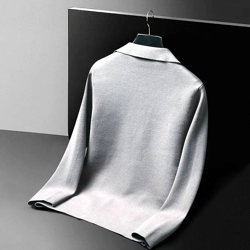 Full shot of a man wearing an elegant Milano cardigan in gray, showcasing a classic, comfortable, and refined fit.