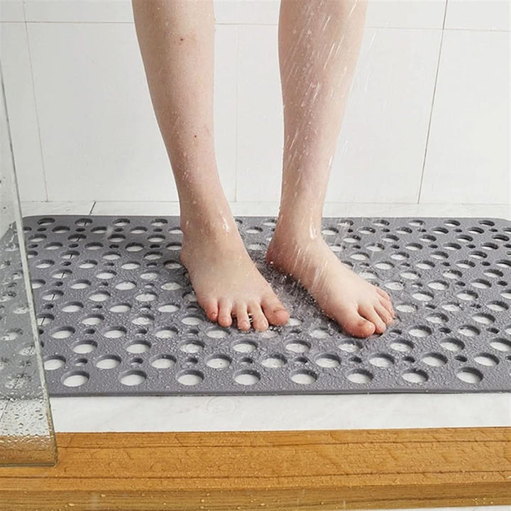 Durable PVC anti-slip shower mat for reliable bathroom safety. Non-skid, hygienic & comfortable bath mat.