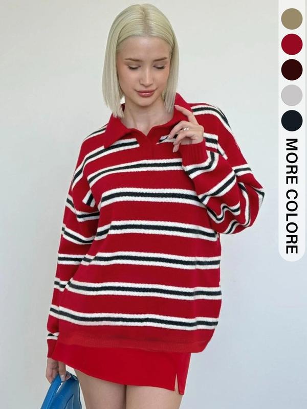 Elegant women's striped knit sweater. Refined long sleeve pullover, comfy for everyday fall and winter fashion.