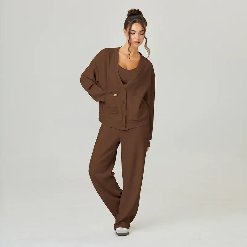 Stylish gray women's two-piece knit loungewear set with a cozy cardigan and wide-leg trousers.