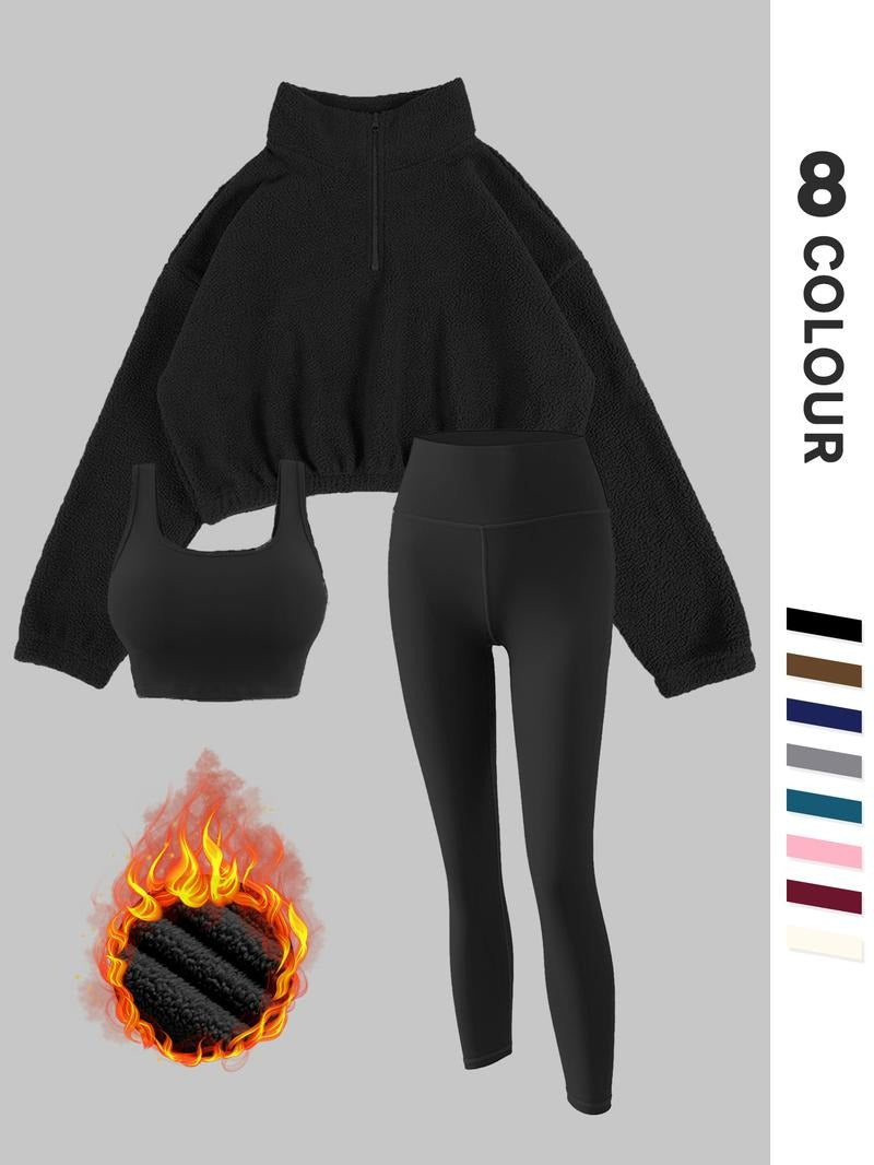 Stylish women's thermal fleece outfit set. Cozy sculpting leggings & matching pullover for warmth and active style.