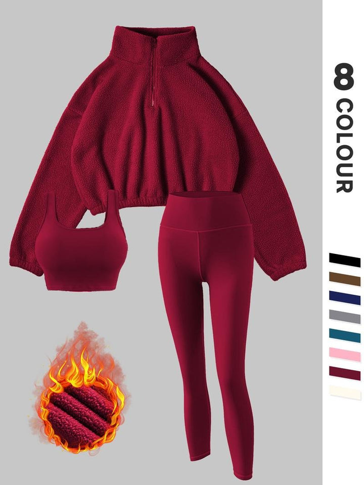 Warm women's thermal fleece active set, featuring comfortable leggings and a soft pullover for cold weather training.