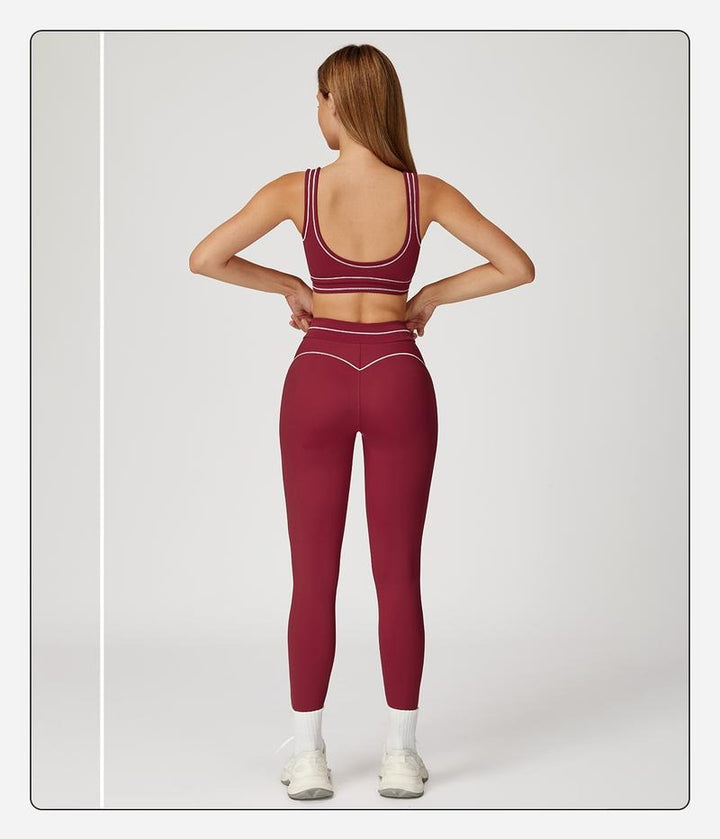Supportive sculpting sports bra & matching leggings in a women's two-piece active workout set for fitness.