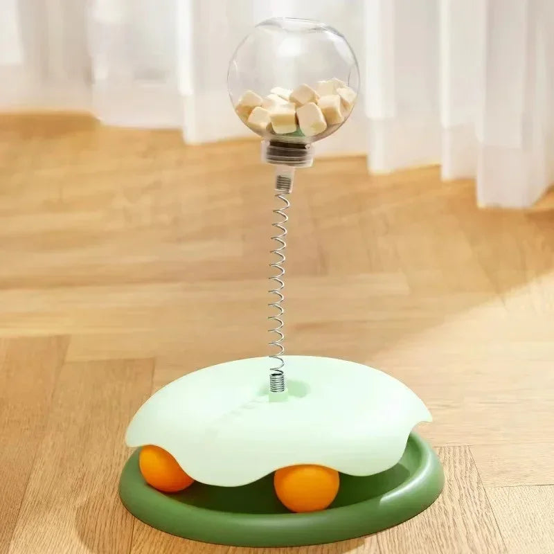 Kitten interactive food dispenser, a yellow tumbler toy for slow feeding and enrichment activity.