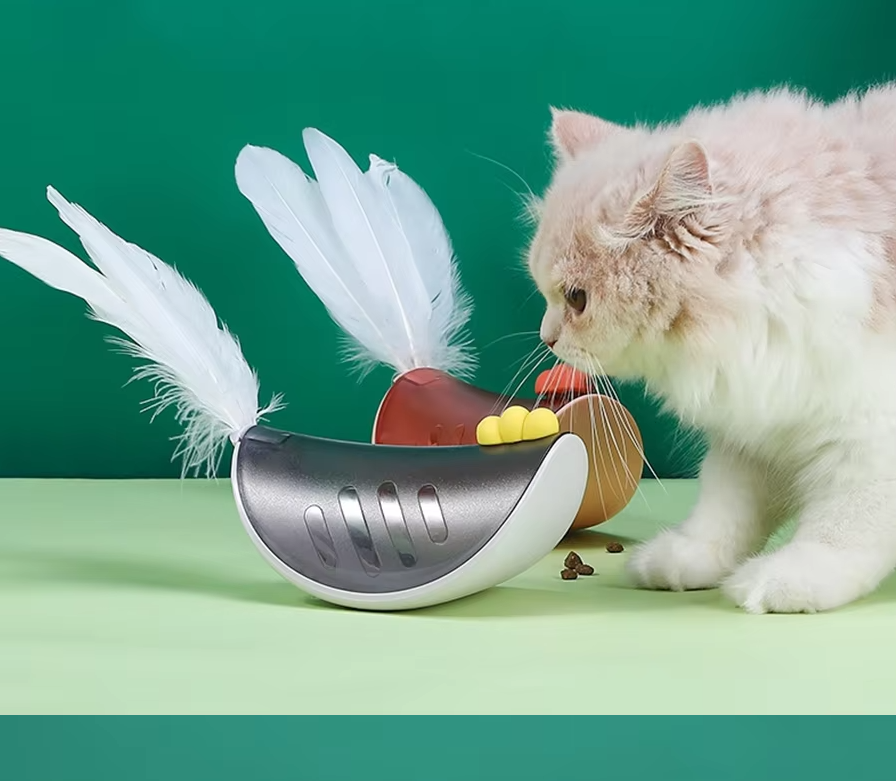 Interactive cat toy with feather wand and treat dispenser for feline fun and enrichment