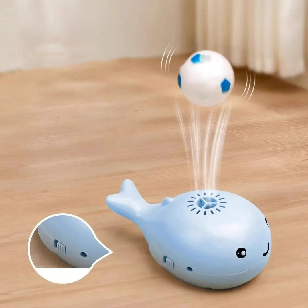 Interactive whale electric cat toy, gliding across floor, entertaining kitten.