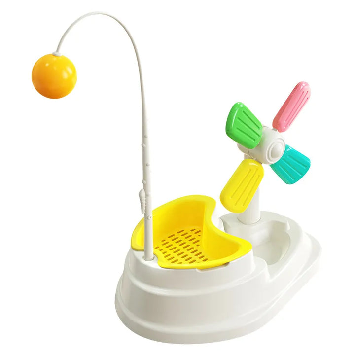 Feline enrichment windmill toy in action, encouraging a cat's natural hunting instincts