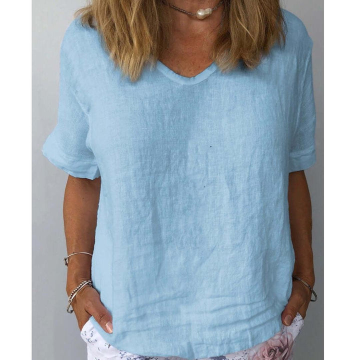 Dark blue women's versatile relaxed fit short sleeve v-neck top, great for summer fashion & everyday comfort.
