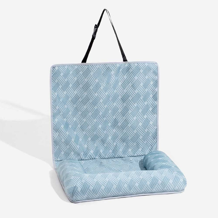 Detail of the cooling fabric on a pet travel bolster car seat bed for dogs, with soft bolsters.