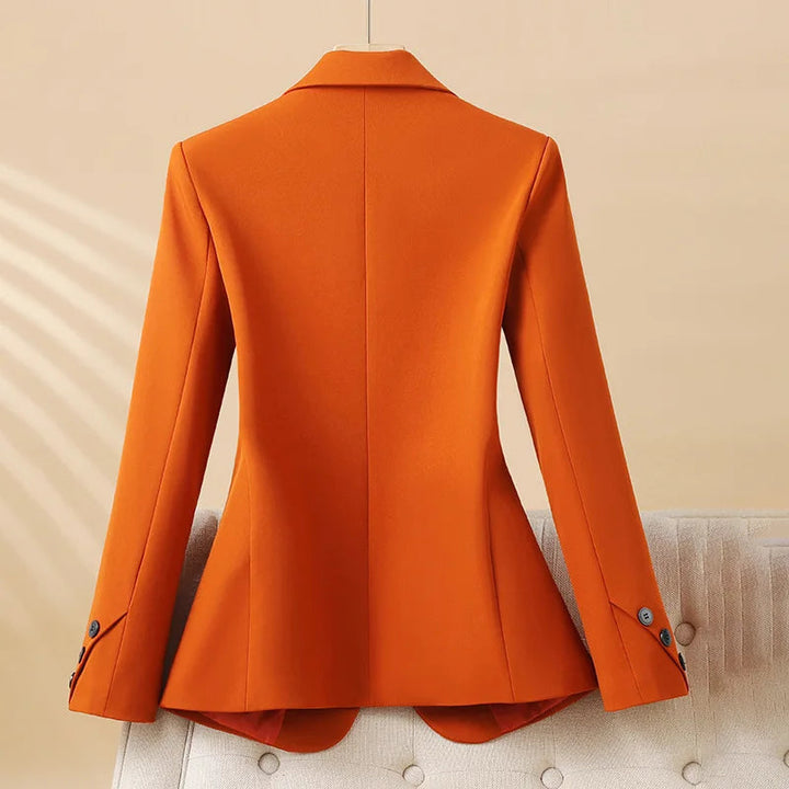 Chic single-breasted fitted blazer for women, features long sleeves & notch lapel for versatile workwear.