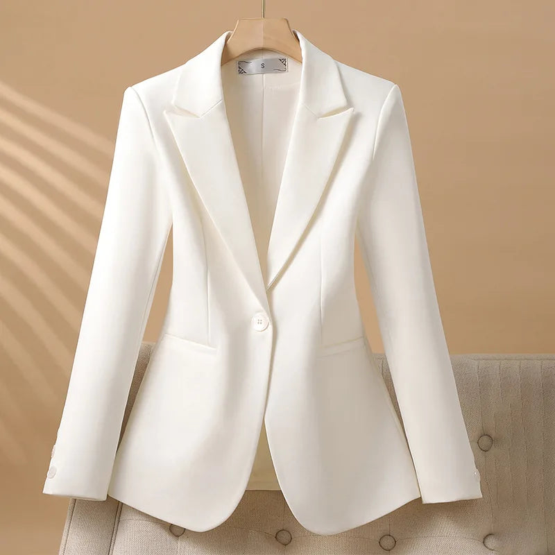 Stylish women's fitted blazer, an elegant long sleeve jacket for a professional and chic office look.
