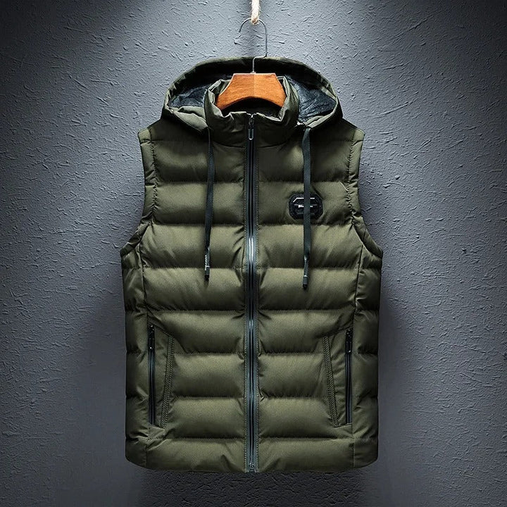 Water-resistant men's insulated alpine vest, lightweight outdoor gear designed for winter adventures.