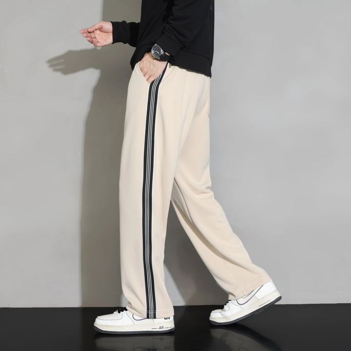 Athletic style men's stripe joggers, relaxed fit casual pants perfect for leisure & comfort.