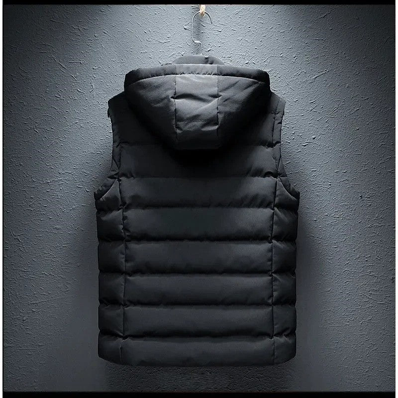 Versatile men's insulated alpine vest with a detachable hood, ideal for layering & outdoor adventures.