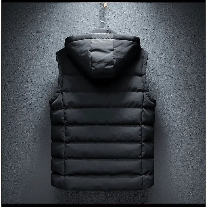 Versatile men's insulated alpine vest with a detachable hood, ideal for layering & outdoor adventures.