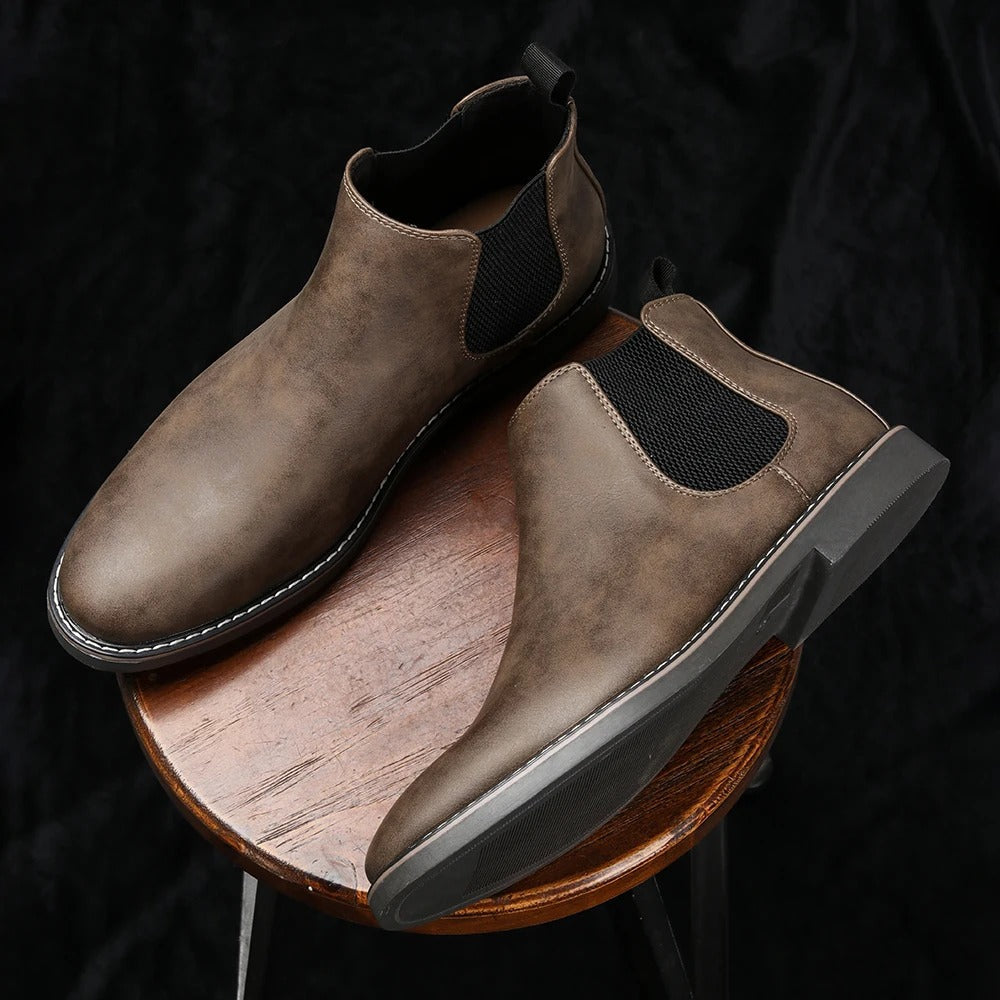 Elegant men's leather Chelsea boots, perfect dress footwear for office, events, or stylish casual looks.