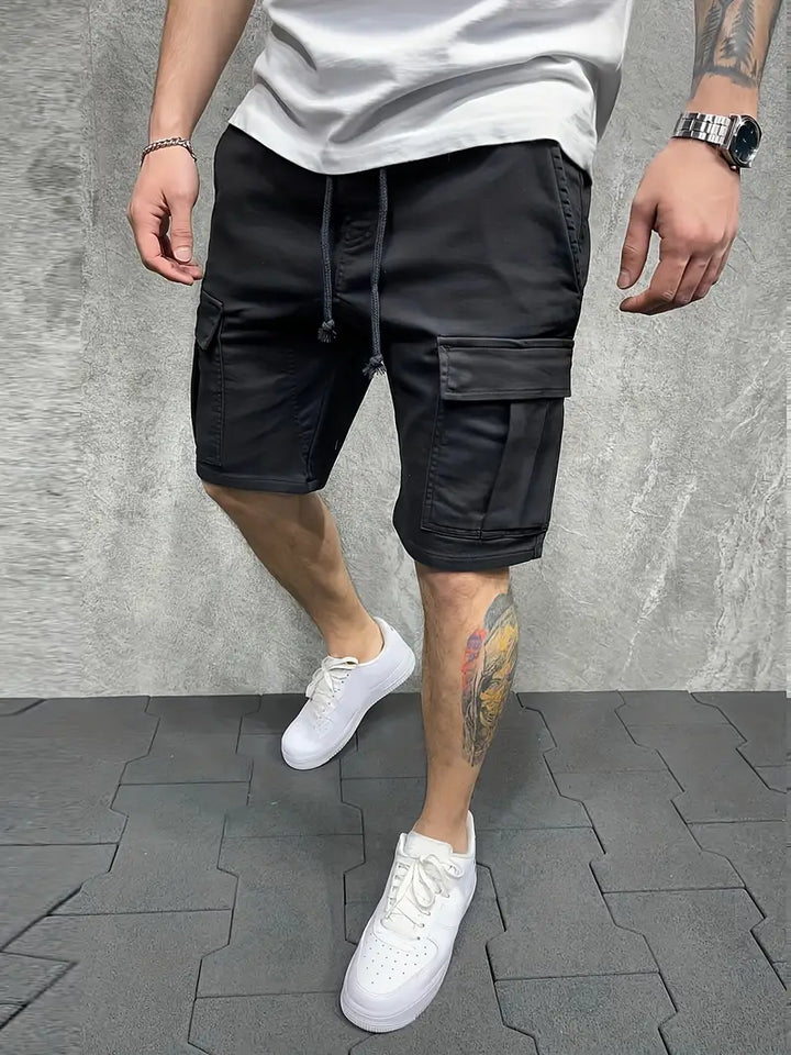 Man wearing comfortable men's cargo drawstring shorts, ideal for outdoor activities or casual wear.