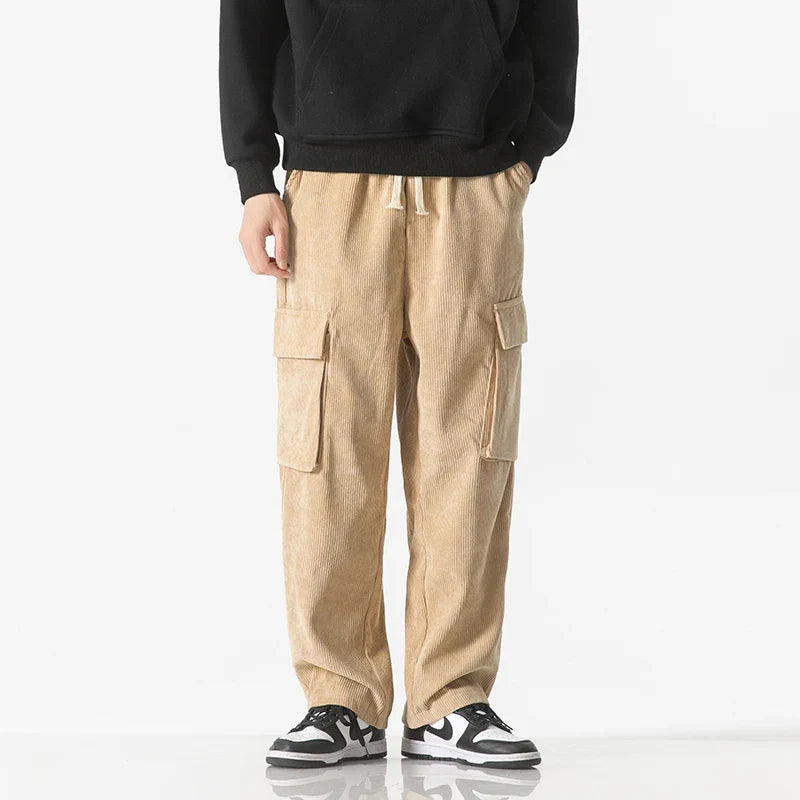 Man wearing comfortable drawstring cargo pants, showcasing a casual everyday style.