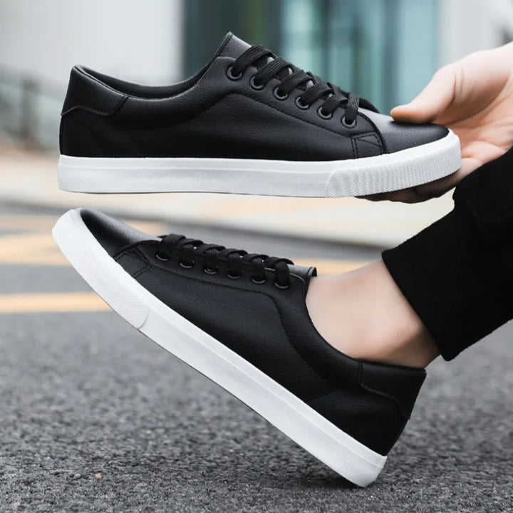 Modern design men's low-top casual sneakers. Lace-up closure for comfortable, versatile everyday style.