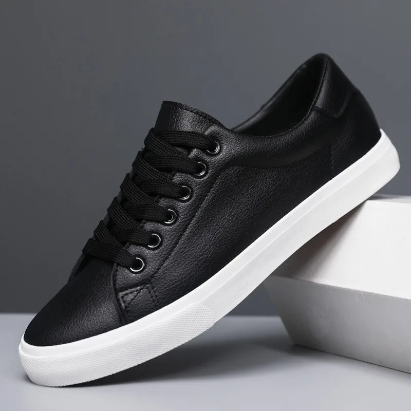 Stylish men's low-top lace-up sneakers, offering versatile everyday comfort for casual walking shoes.