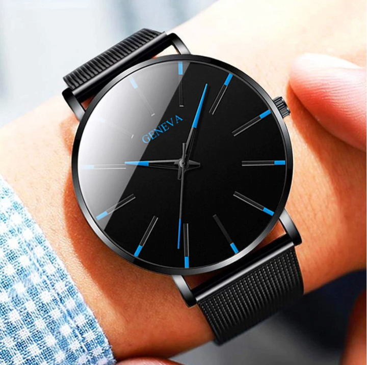 Men's minimalist watch with elegant blue dial accents & a sleek black strap. Perfect everyday fashion accessory.