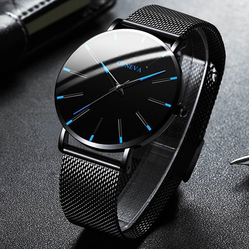 Modern minimalist men's quartz watch with sophisticated blue accents and a durable black strap. An ideal accessory.