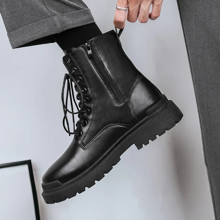 Black men's ankle combat boots with secure lace-up closure, functional side zip, and tough durable design.