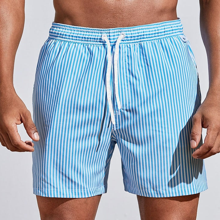 Stylish men's striped swim shorts with adjustable drawstring. Comfortable activewear for beach & pool.