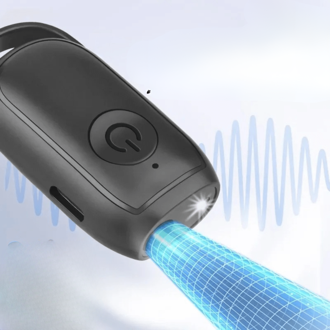 Portable ultrasonic dog trainer, effectively curbs barking with humane technology, ideal pet behavior tool.