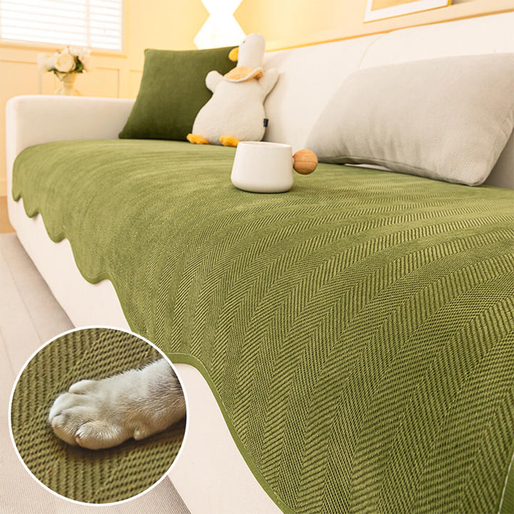 Minimalist herringbone chenille couch cover in light grey, non-slip wavy edge design for sofa protection.