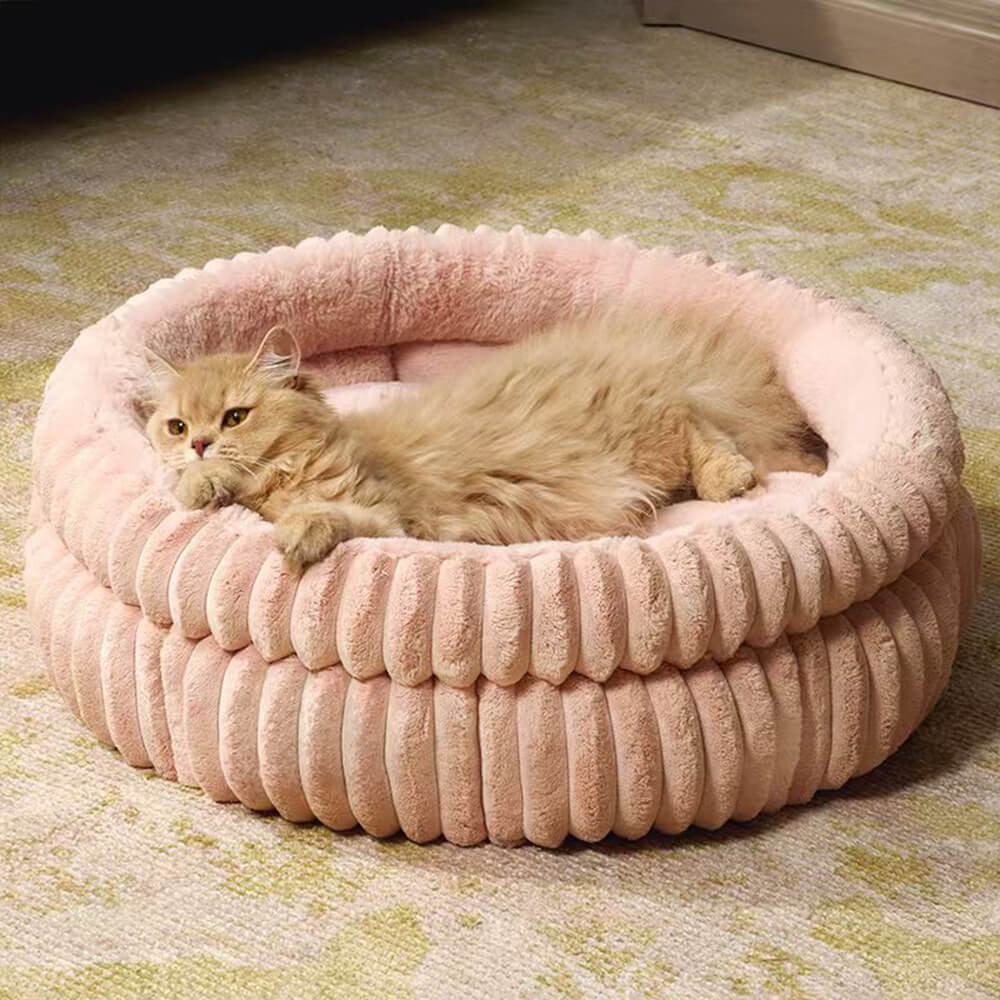 Soft faux fur interior of a minimalist dog bed, offering warmth and comfort for pets