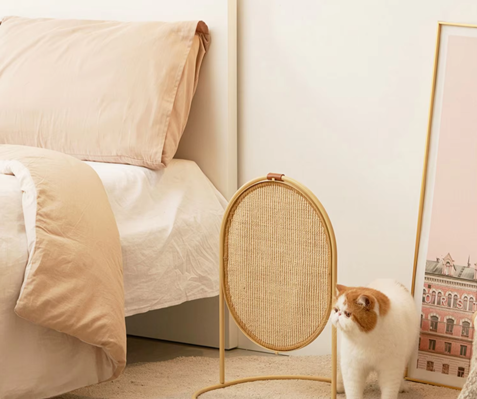 Contemporary pet scratching post featuring a sturdy sisal wrap and a playful hanging ball, promoting healthy claws