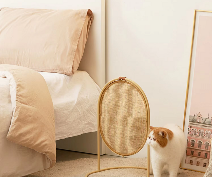 Contemporary pet scratching post featuring a sturdy sisal wrap and a playful hanging ball, promoting healthy claws